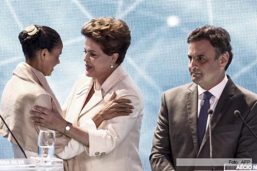 Silva, Rousseff y Neves ante las camaras, el martes a la noche