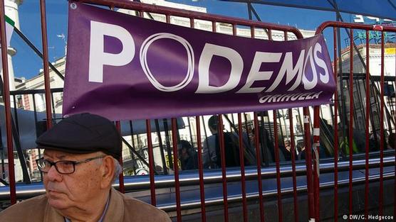 Un cartel de Podemos en la última marcha
