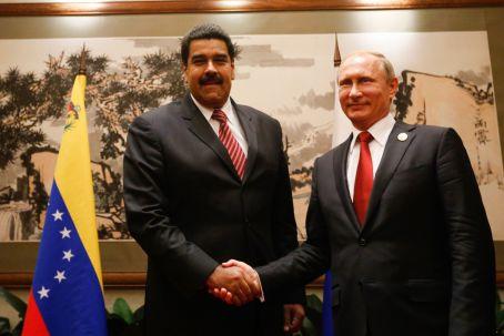 Maduro y Putin, ayer en Beijjing