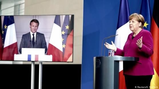 Merkel y Macron en la teleconferencia ayer lunes